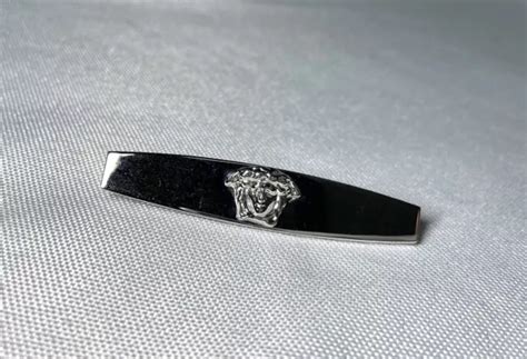 fermacravatta versace